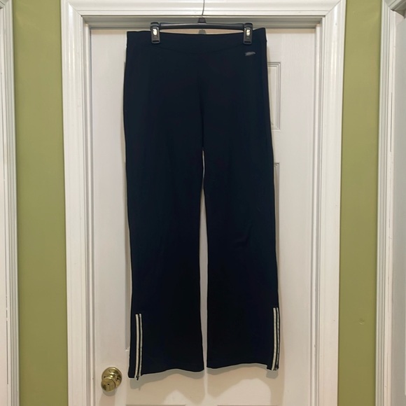 Athleta- black boot cut flare zipperr hem yoga leisure pantss - size L - Picture 1 of 7